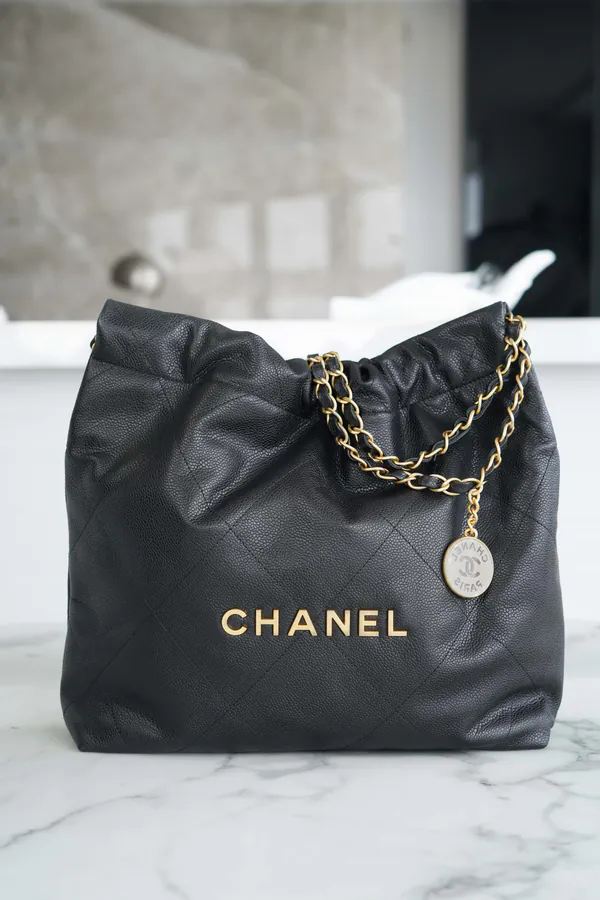 CHANEL 24B Small Black Gold-Tone Closure Handbag
